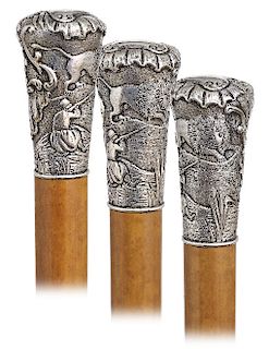 105. Silver Lion Hunting Cane -Ca. 1850 -Large silver knob hand chased and engraved with a panel showing a man hunting a lion on one side and lavish B