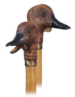 114. Automated Duck Head Cane -Ca. 1900 -Fruitwood handle naturalistically carved in the shape of a duck head enlivened with a decently stained feathe