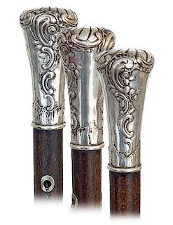 130. Early Silver Dress Cane -Ca. 1820 -Silver knob fashioned in a beautifully stretching Milord knob and delicately hand chased and engraved in the B