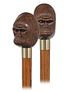 161. Gorilla Cane -20th Century -Dark and striped tropical wood knob carved to depict a Gorilla head showing the typical bare face with flat nose and 