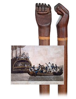 169. Classic Pitcairn Island Cane -Ca. 1900 -Redwood right fist handle on its coconut wood shaft with a light colored, flush set and joining wood wash
