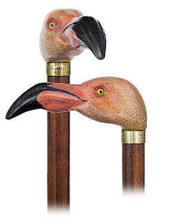 176. Pink Flamingo Head Cane -Ca. 1950 -Fruitwood handle carved and highlighted with a naturalistic pink color and inset glass eyes to depict a pink f