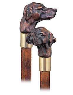 182. Dog Head Day Cane -Ca. 1920 -Bronze knob cast in the shape of a long eared setter head, plain metal collar, pepper bamboo shaft and a brass ferru