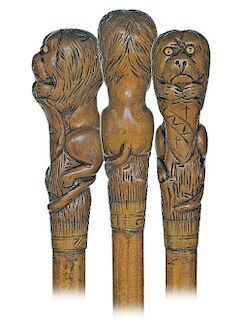 186. Boxwood Lion Cane -Ca. 1900 -Figural boxwood handle carved as a heraldic lion on its stepped malacca shaft with brass ferrule. Pleasing informal 