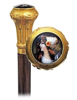 6. Limoges Enamel Cane -Ca. 1890 -Milord shaped, gilt metal knob with a longer and tapering body hand chased with vertical sprays and encircling flowe