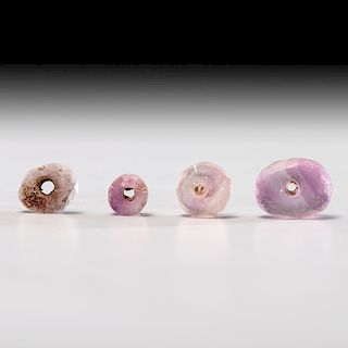 Four Lavender Fluorite Disc / Donut Beads; Largest 1/2 in.