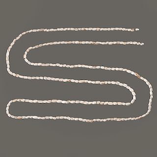 A Long Strand of Shell Beads, 60 in.