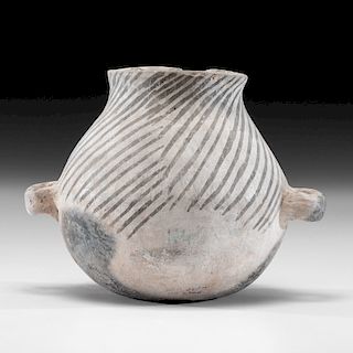 An Anasazi Black-on-White Canteen, 6-1/4 x 9-1/4 in. 