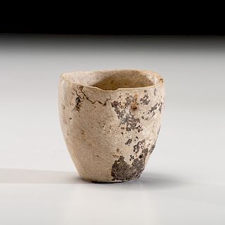 An Archaic Limestone Cup, 2 in.