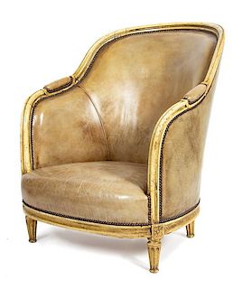 A Louis XVI Style Leather-Upholstered Painted Bergere Height 39 inches.