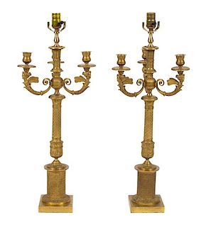 A Pair of Empire Style Gilt Bronze Candelabra Height overall 34 inches.