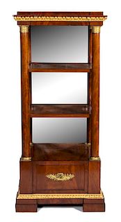 An Empire Style Gilt Metal Mounted Mahogany Etagere Height 58 x width 25 1/2 x depth 21 inches.