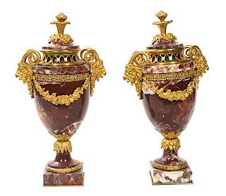 A Pair of Large Neoclassical Gilt Bronze Mounted Marble Urns Height 27 inches.