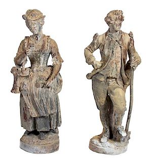 A Pair of Patinated Lead or Cast Metal Figures Height 52 1/2 inches.