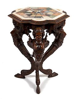 An Italian Carved Walnut and Specimen Marble Side Table Height 28 x width 21 x depth 21 inches.