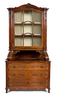 A Provincial Walnut Meuble à Deux Corps Height 94 x width 47 x depth 26 inches.