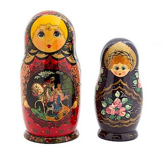 Two Russian Matryoshka Nesting Dolls Height of largest 10 1/2 inches.