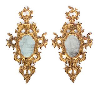 A Pair of Venetian Carved Giltwood Mirrors Height 33 1/4 inches.