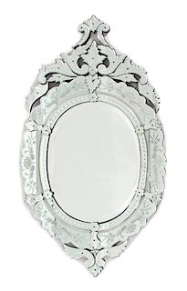 A Venetian Etched Glass Oval Mirror Height 58 x width 31 inches.