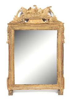 A Louis XVI Style Carved Giltwood Mirror Height 53 x width 28 1/2 inches.