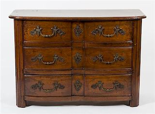 A French Provincial Walnut Commode Height 34 x width 49 1/2 x depth 21 inches.