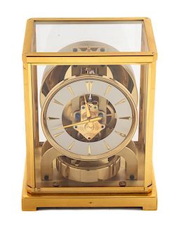 A Le Coultre Brass and Glass Cased Atomic Clock Height 8 3/4 inches.