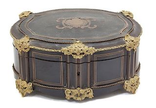 A Louis XV Style Ebonized and Brass Inlaid Cartouche-form Jewelry Box Height 6 1/4 x width 13 x depth 10 1/4 inches.