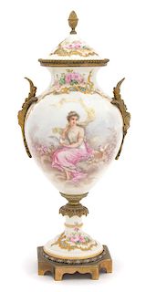 A Sevres Style Gilt Bronze Mounted Porcelain Urn Height 15 1/2 inches.