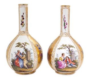 A Pair of Dresden Polychrome and Gilt Decorated Bottle form Vases Height 18 1/2 inches.