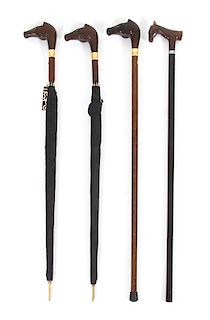 A Group of Italian Horsehead Handled Canes and Umbrellas Length 35 1/2 inches.