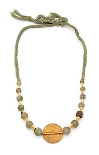 Irena Corwin, (American, 20th Century), Necklace of 17th century Benin glass beads with gold beads and an Ashanti fetish gold so