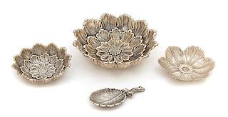 Three Italian Silver Flower Bowls and a Spoon, Gianmaria Buccellati, Milan 20th Century, comprising a Dahlia pattern bonbon dish