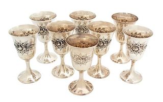 Eight American Silver Stemmed Goblets, Stieff & Co., Baltimore, MD, having chased floral decoration.