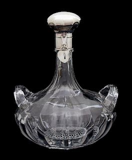 A Sterling Silver Plate Collared Crystal Ship's Decanter Height 13 1/2 inches.