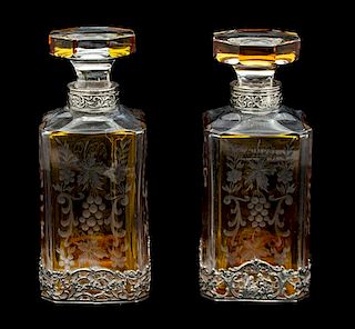 A Pair of Continental Etched Clear and Amber Glass Decanters with Silver Mounts Height 8 1/4 inches.