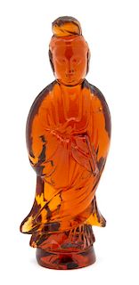 An Amber Colored Molded Glass Figure of Guan Yin Height 9 1/2 inches.