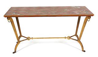 A Painted and Gilt Iron Center Table in the Style of Rene Rouet Height 30 x width 60 x depth 22 inches.