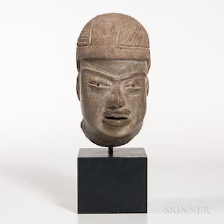 Olmec Terra-cotta Head, c. 1000-400 BC, portrait head of a baby, with full lips and slightly open mouth with teeth, well-modeled nose b