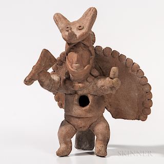 Colima Warrior Figure, West Mexico, c. 100 BC-250 AD, the warrior figure with bird wings on his back, wearing a zoomorphic helmet and c