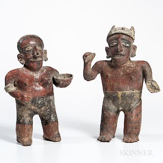 Pair of Nayarit Male and Female Figures, western coast of Mexico, c. 100 BC-250 AD, polychrome decorated hollow pottery figures, the fe