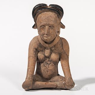 Veracruz Pottery Figure, Mexico, c. 700-900 AD, seated figure with crossed legs and hands on knees, wearing a black tar painted headdre