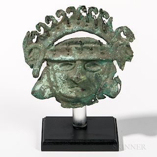 Early Mochica Copper Mask, c. 300 BC-300 AD, the warrior's head with sunken mouth and eyes, wearing a crescent-form openwork headdress