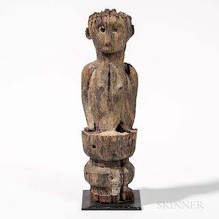 Indonesian Ironwood Post Figure, Sumba, female figure probably atop an architectural element, (age cracks), ht. 15 in.Provenance: Priva