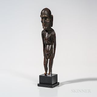 Easter Island Figure, Mo'ai Kavakava, 19th century, wood, bone and obsidian, standing, slightly stooped, male human figure with an ema