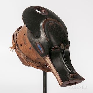 Baule Water Buffalo Helmet Mask, with deep circular collar and projecting square jaw, open mouth incised with zigzagging teeth colored