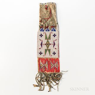 Central Plains Beaded Hide Pipe Bag, Lakota, fourth quarter 19th century, roll-beaded at the top, the beaded panel with early multicolo