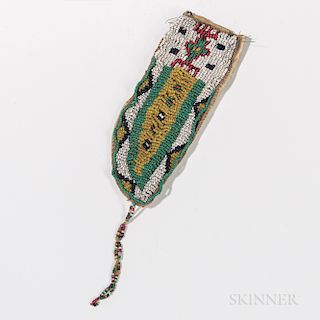 Small Cheyenne Beaded Hide Knife Sheath, fourth quarter 19th century, fully beaded on one side with multicolored geometric designs usin