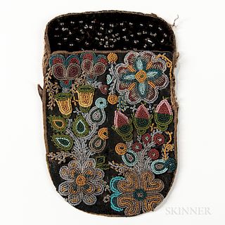 Great Lakes Beaded Bag, c. third quarter 19th century, cloth backed with floral beaded designs, (minor fringe loss), 9 1/2 x 6 in.Prove
