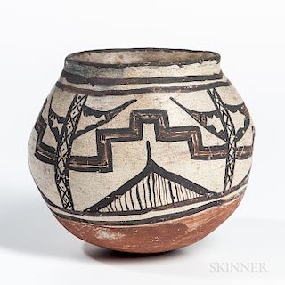 Small Zuni Polychrome Pot, c. 1890s, decorated in black and red on a cream slip, with overall craquelure to the surface, ht. 5 in.Prove