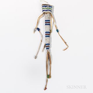 Central Plains Beaded Hide Awl Case, Sioux, c. 1880s, striped beaded designs with four leather tassels attached to the cover and four l